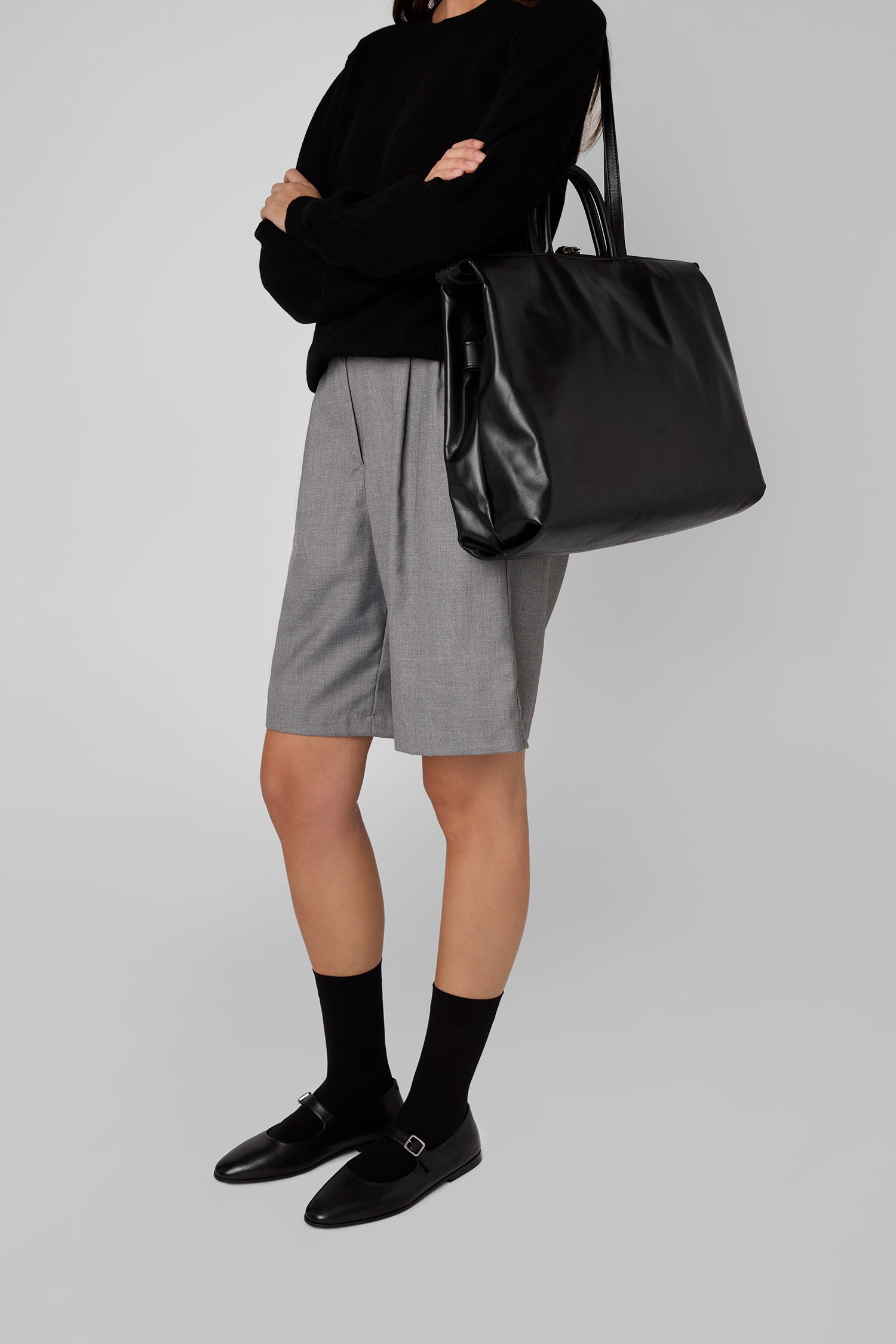 4 In Orizzontale Black Leather Crossbody Bag