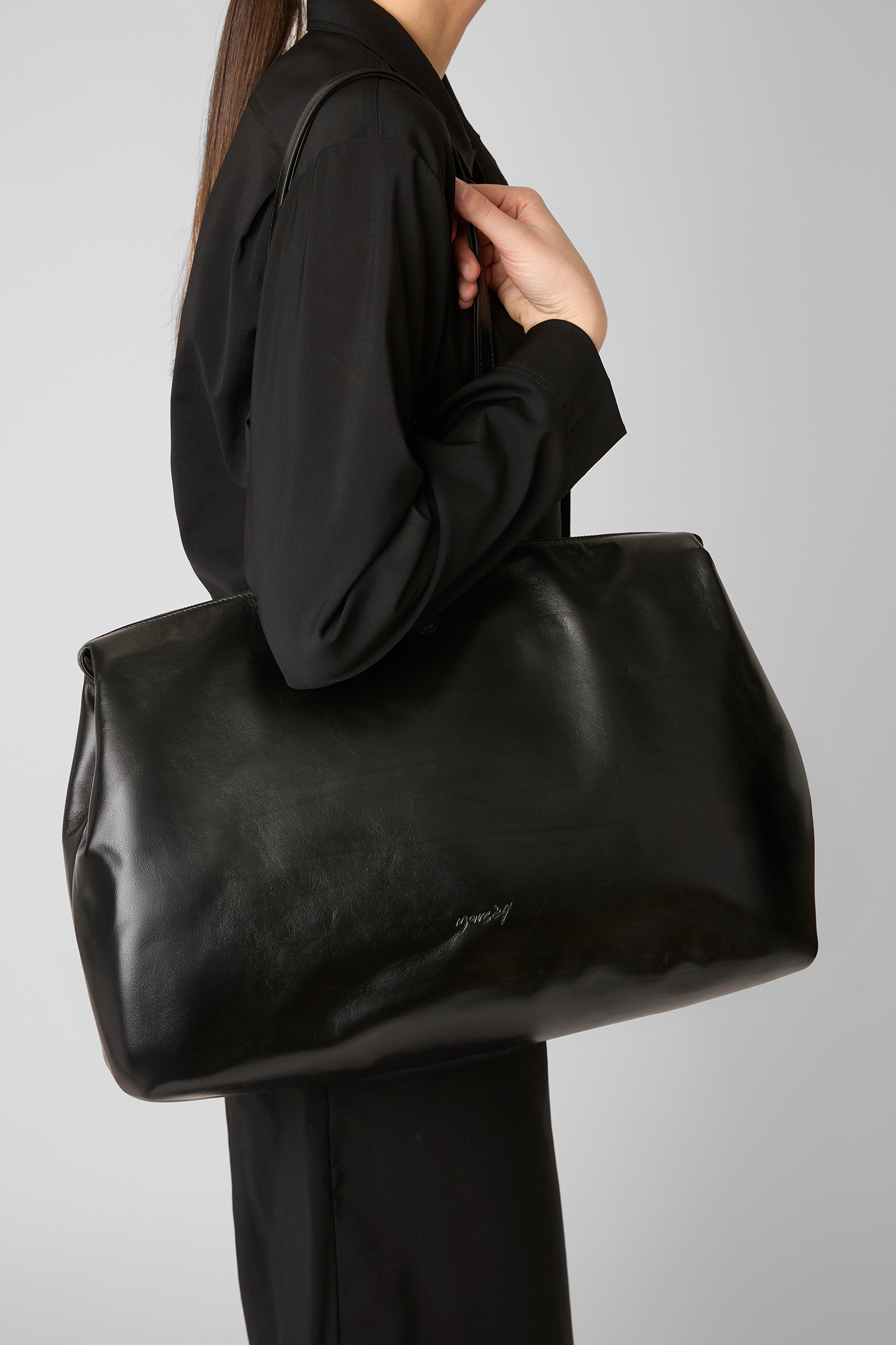 4 In Orizzontale Black Crossbody Bag